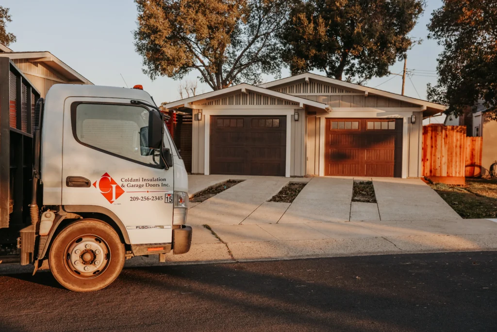 Coldani Insulation truck by garage doors